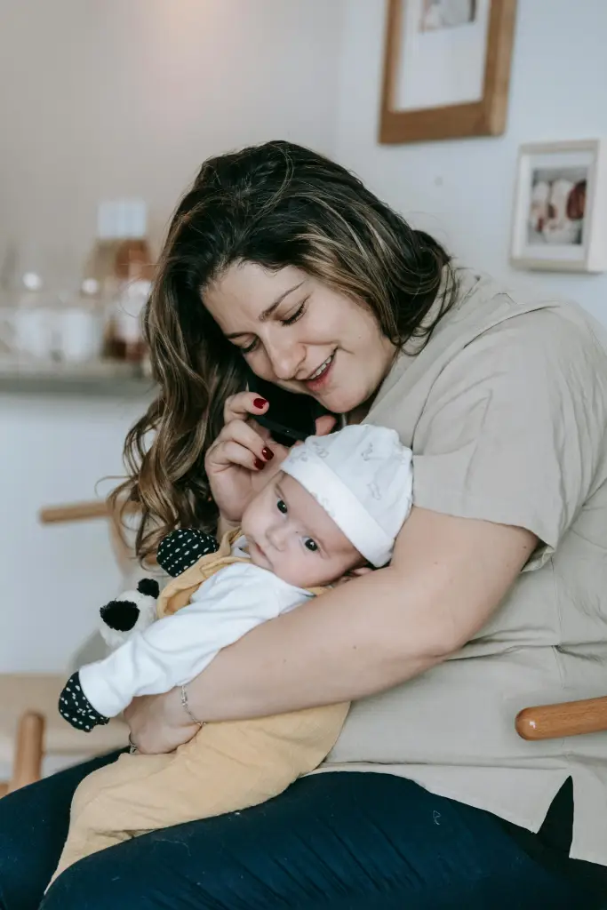 woman looking after pretend baby