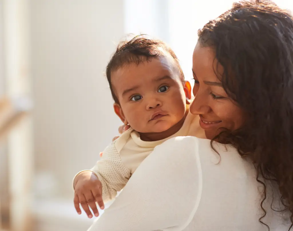 woman holding baby