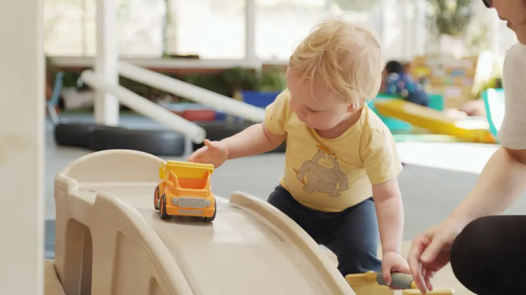 boy playing with truck