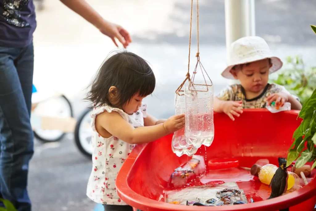 children playing with water